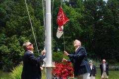 r-Brad-Berry-and-John-Leist-Raising-Flags